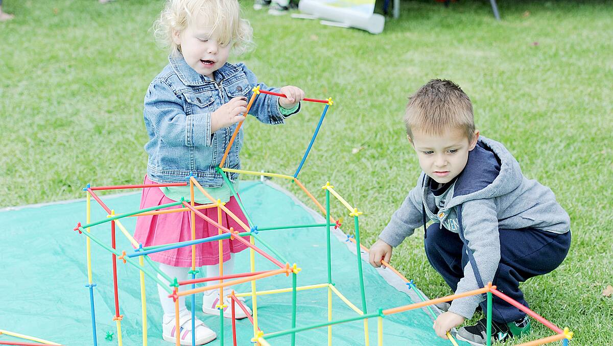 Ava Oakenfull, 18 months, and Angus Kelly, 3 at the Dahlia and Arts Festival family fun day. Picture: Jodie Donnellan