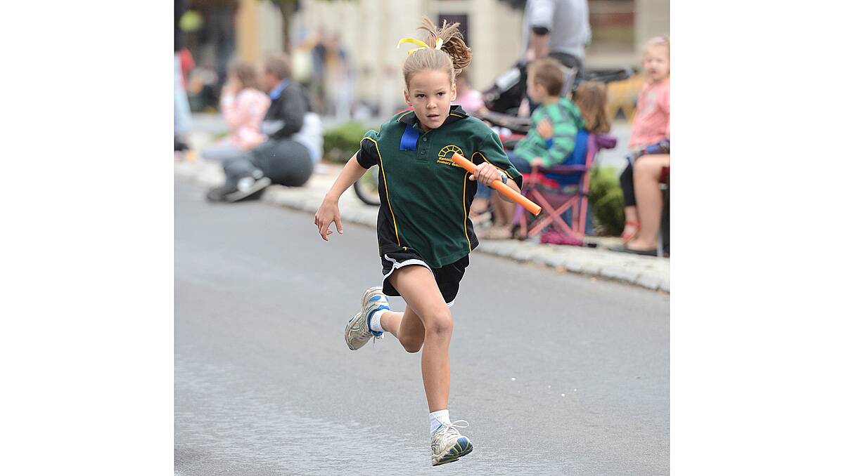 Elka Barnett runs for Kennington Primary School in the Relay race. Picture: Jim Aldersey.