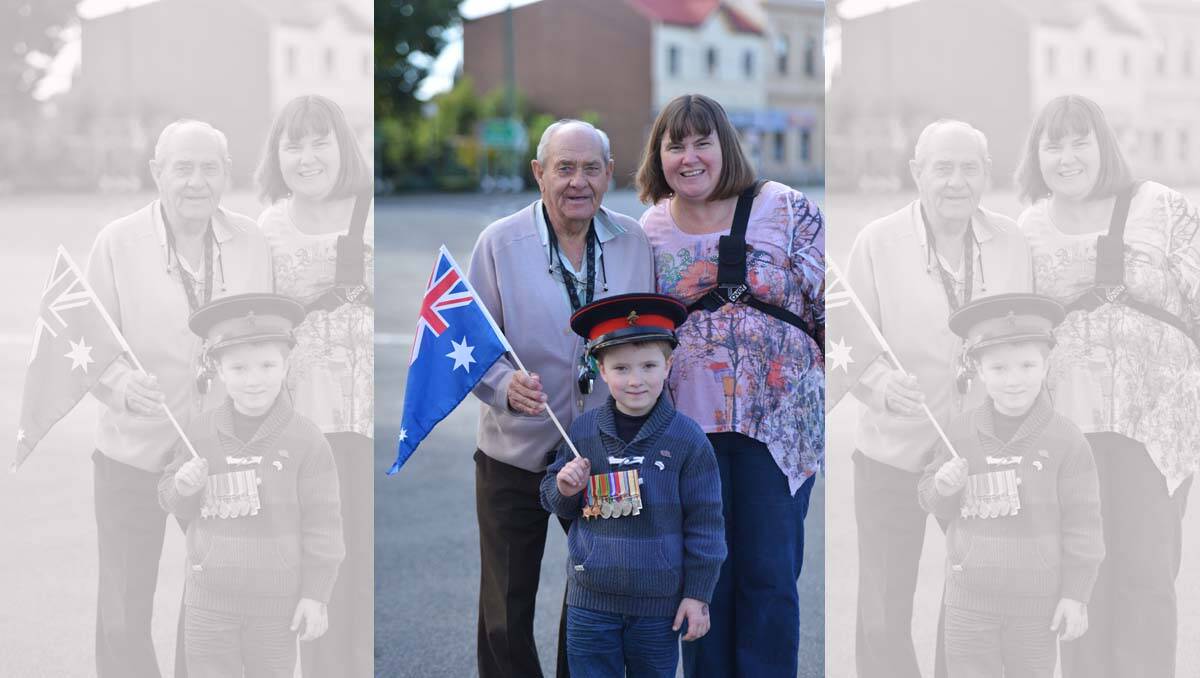 Eaglehawk Anzac Day service. William Hemmes-Windsor (front), Ronald Windson and Cathleen Windsor. Picture: Brendan McCarthy
