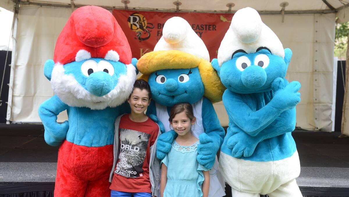 2013 Bendigo Easter Festival. Michael and Sarah Giaquinta with The Smurfs in Rosalind Park festivities. Picture: Jim Aldersey 