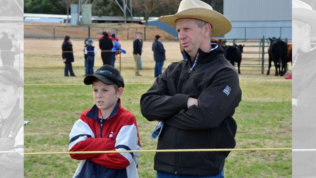 Beef & Cattle Show, Bendigo Showgrounds. Lucas and Sean Kallady from Gippsland watching the judging from the sidelines. Picture: BRENDAN MCCARTHY.