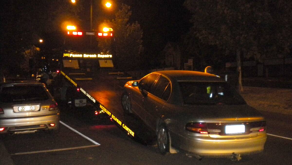 A car being impounded in Bendigo earlier this year. Picture: Peter Weaving