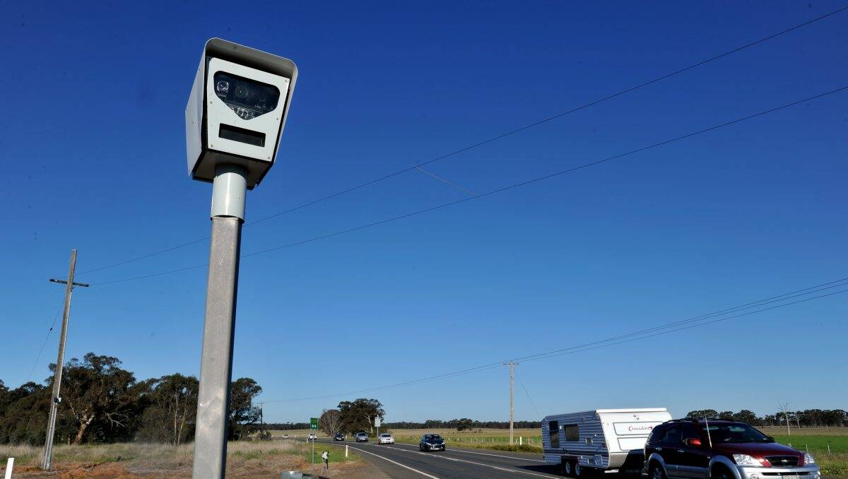 Watchful: A speed camera monitors traffic at the Bagshot level crossing. Picture: JULIE HOUGH