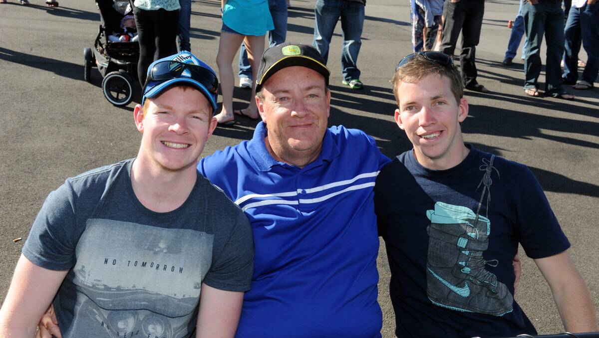 Faces at the BFNL grand final. Ben, John and Will Hill. Picture: Jim Aldersey