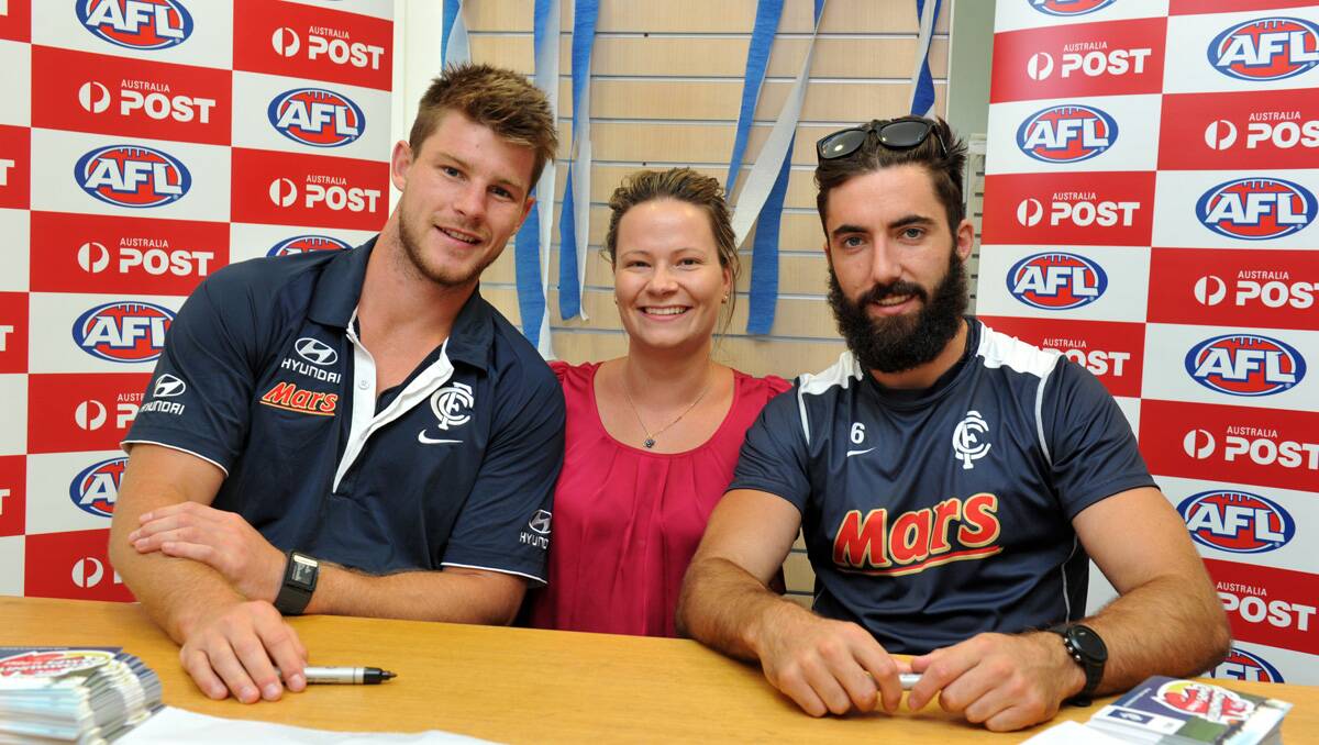 Bryce Gibbs and Kade Simpson meet some fans. Picture: Jim Aldersey