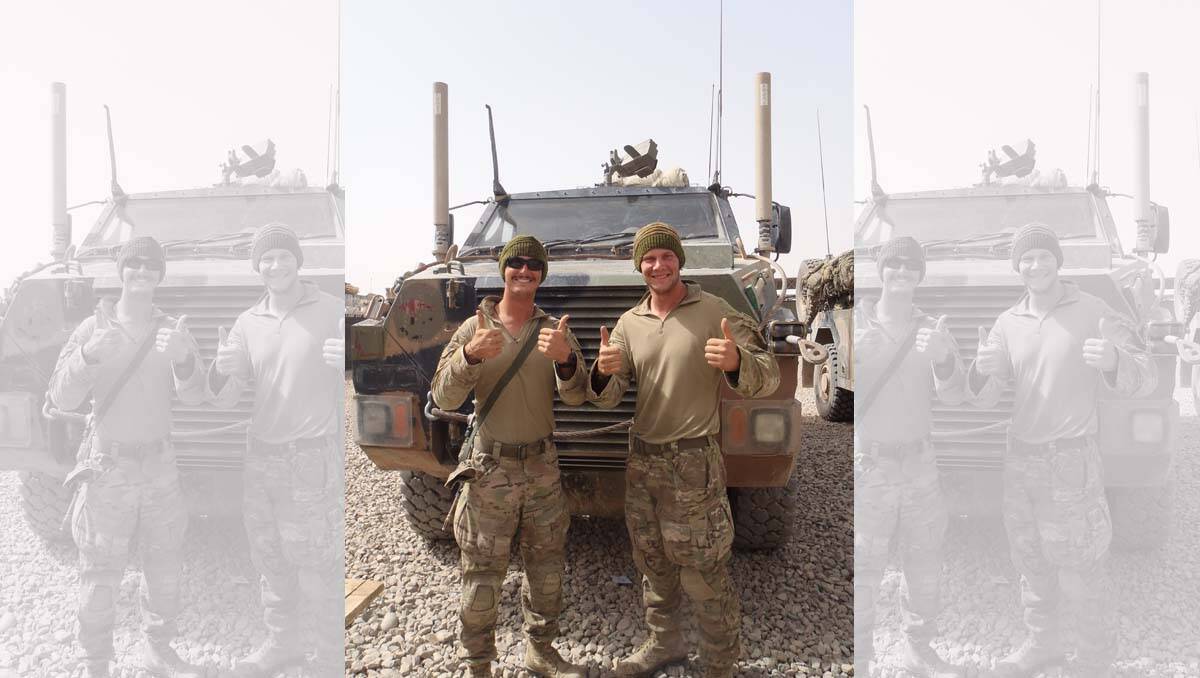 MATES: Damien Allen, right, will be home in Bendigo for Christmas after service in Afghanistan. He is pictured with fellow soldier Blake Southwell.