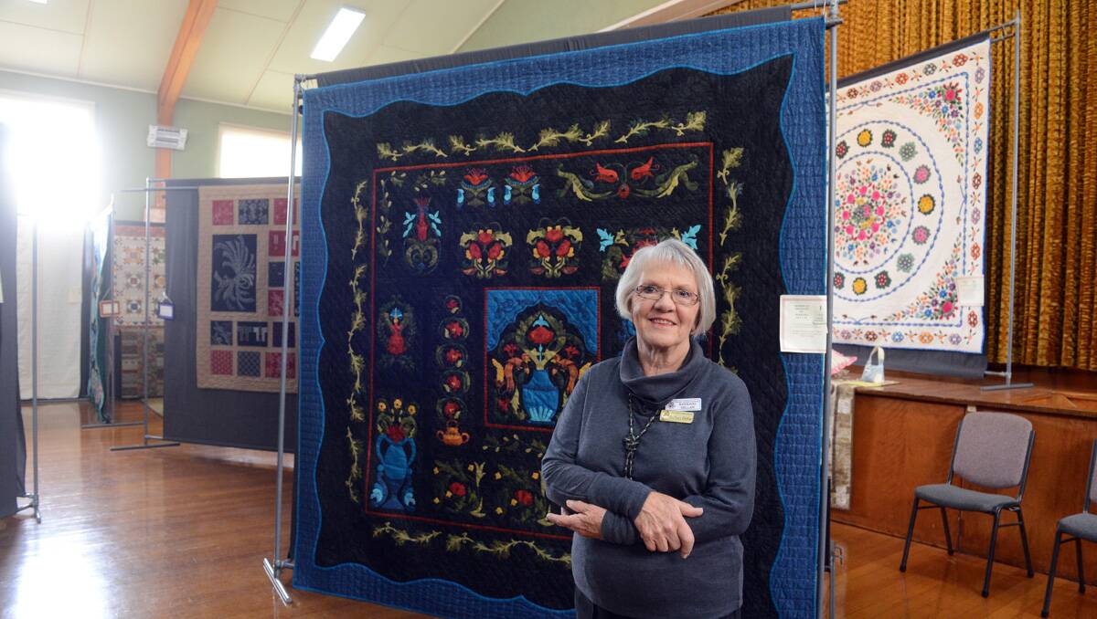 2013 Bendigo Easter Festival. A Parade of Quilts. Barbara Dellar with her piece "Morris At Midnight". Picture: Jim Aldersey