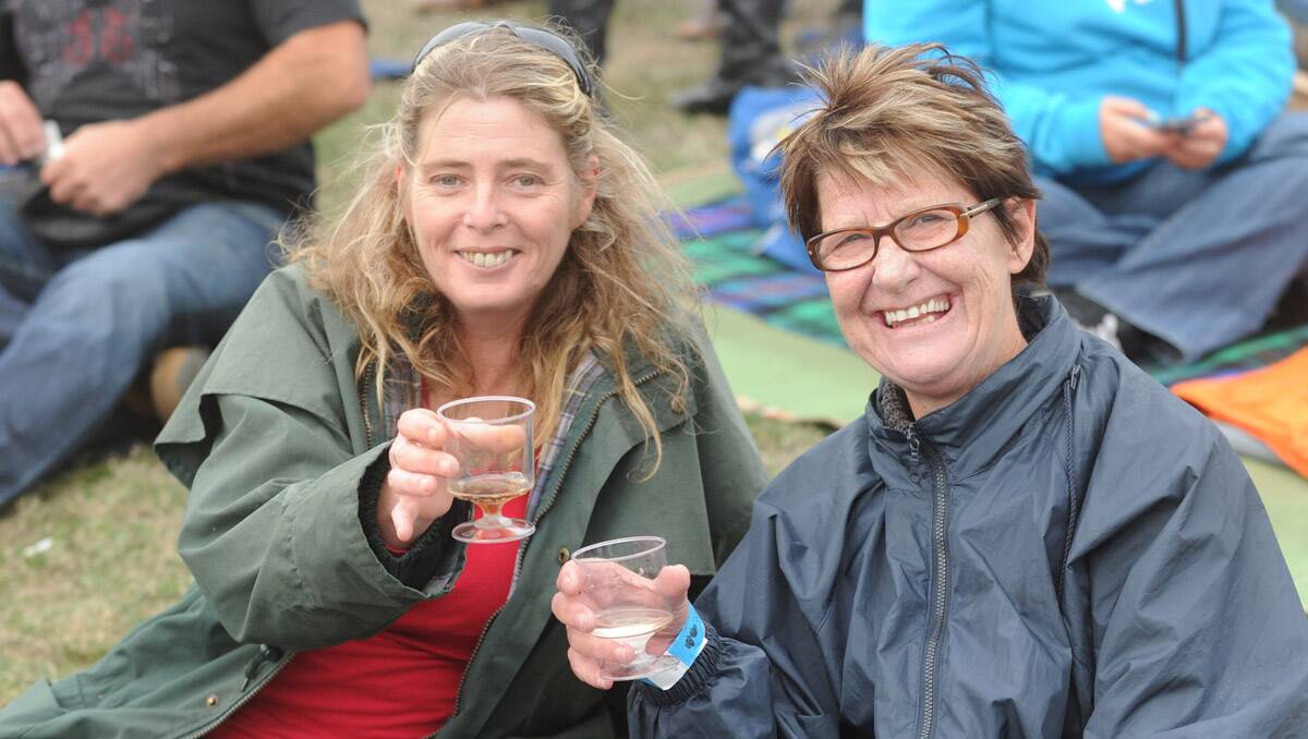 Bruce Springsteen and the E-Street Band perform at Hanging Rock. Tracy McMahon and Dawn Fahey. Picture: Jodie Donnellan