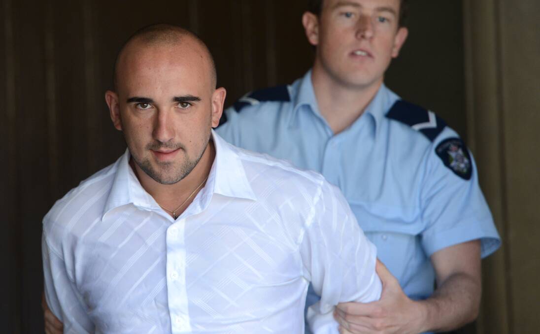 ‘COWARDLY’: Reece Sleeth is led from court on Tuesday.
