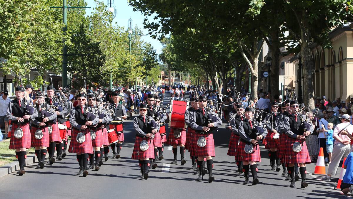 A pipe down marches down View Street to kick off the first Scots Day Out in Bendigo. Picture: Peter Weaving