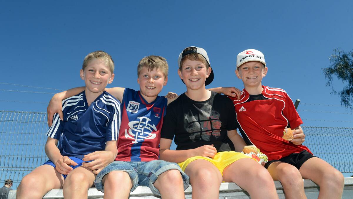 Faces at the BFNL grand final. Ethan Featherby, Jeremy Ellis with Zac and Jai Featherby. Picture: Jim Aldersey