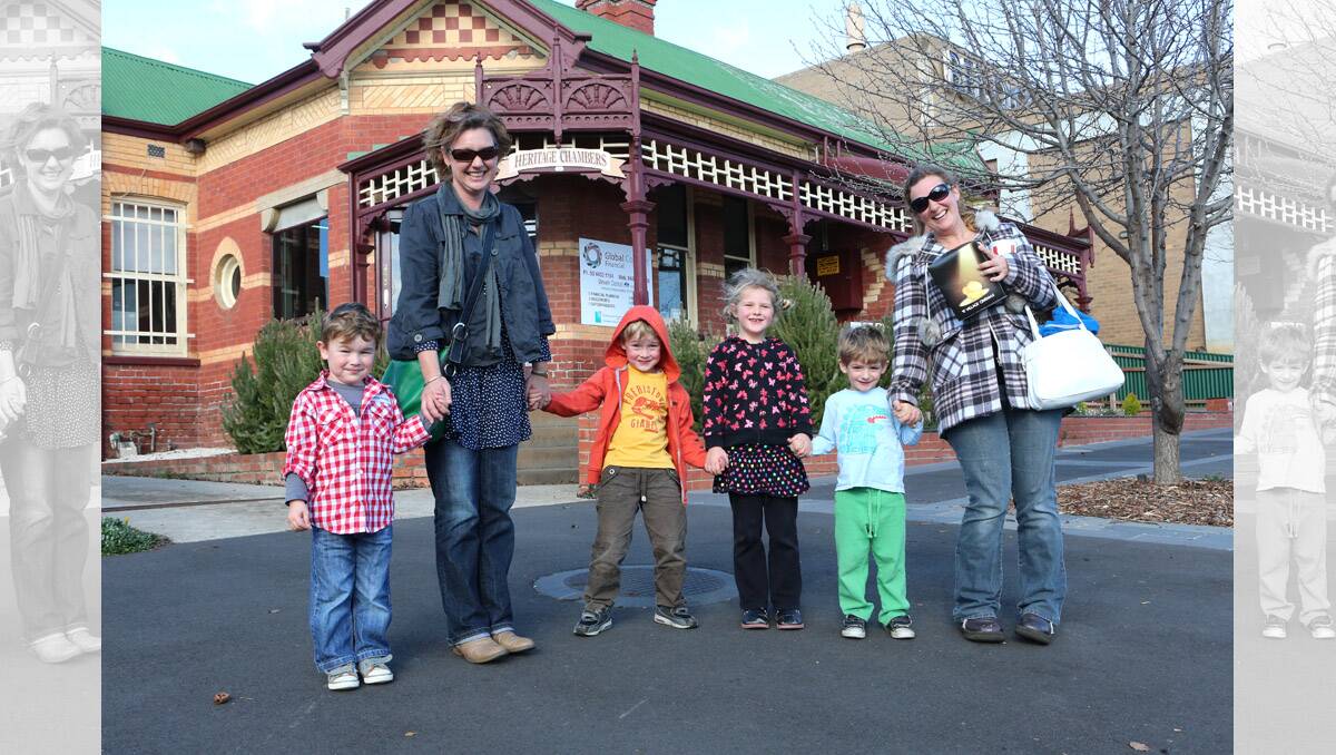 Bendigo cinema, business is booming during the school holidays. Jodie Entwistle-McGowan with Paddy and Declan and Sarah Williams with Ella and Jack  after watching Epic. Pictures: Peter Weaving 