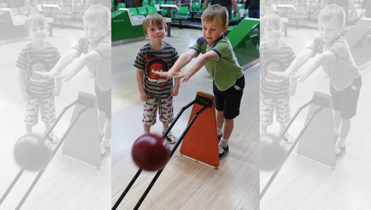 Dragon City Lanes, lanes are full during the school holidays. Hamish and Elliot Forsyth from Flora Hill. Pictures: Peter Weaving 
