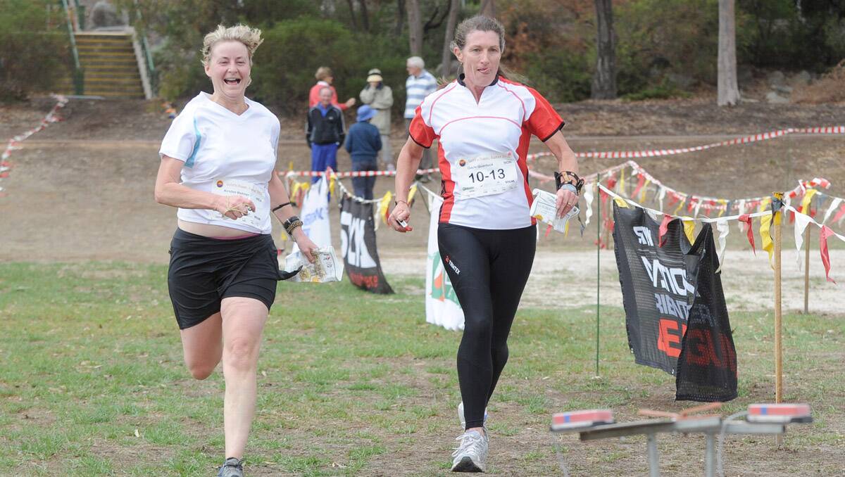 2013 Bendigo Easter Festival. National Orienteering League. Kirsten Wehner from Canberra and Gayle Quantock from Newcastle. Picture: Jodie Donnellan