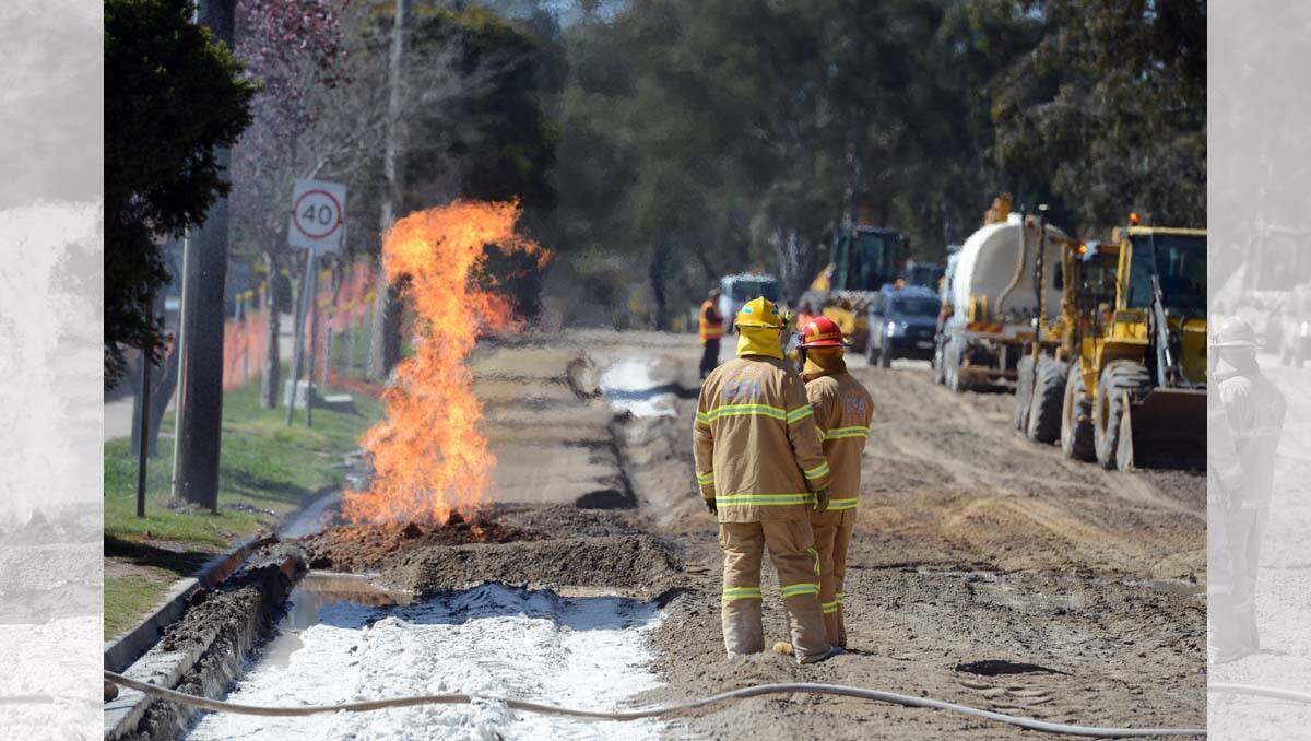 A ruptured gas main in Kangaroo Flat catches fire. Picture: Jim Aldersey