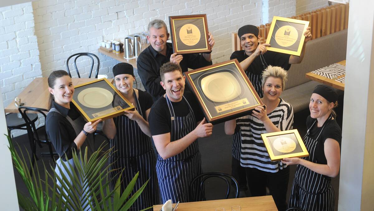 Masons staff celebrate their win at the Golden Plate Awards last year.