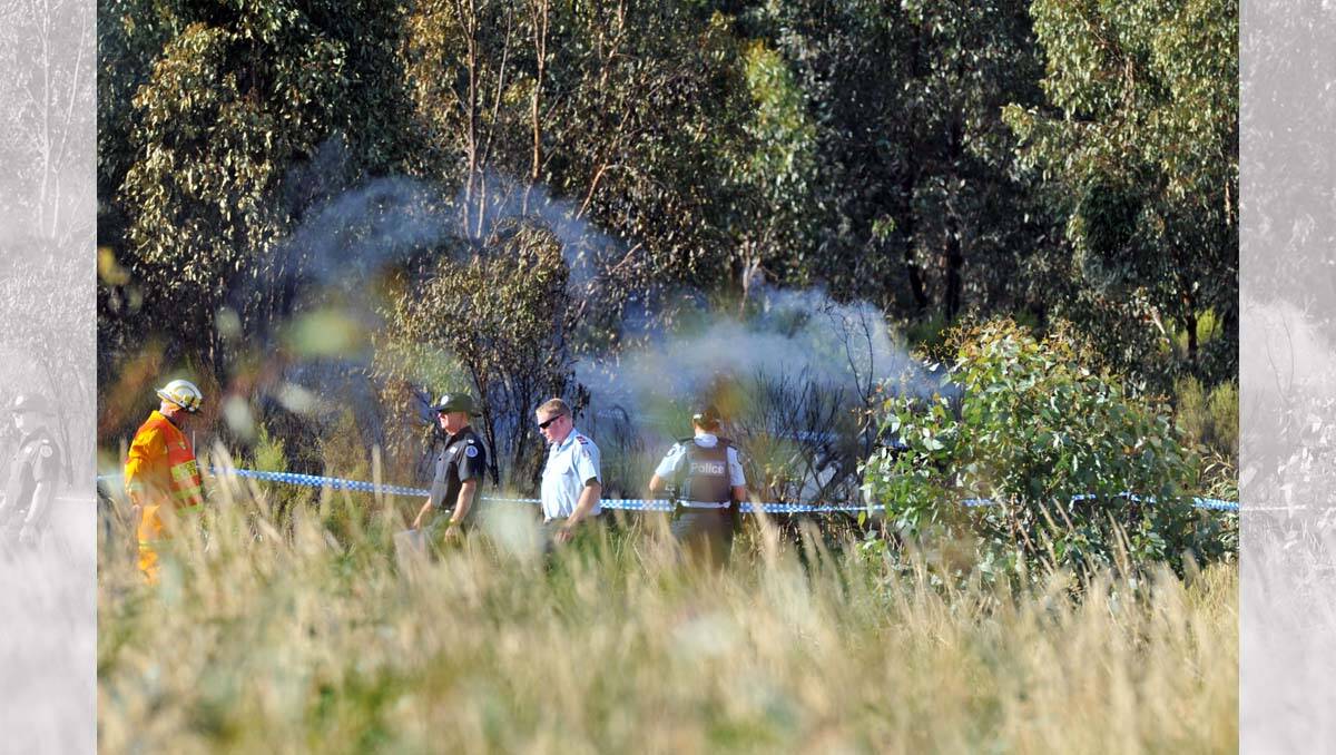 Emergency services at the scene of a light-plane crash in Maryborough. Picture: Brendan McCarthy