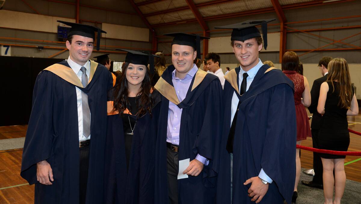 La Trobe University Bendigo graduation. Glenn McComb, Rachel Elliott, Fergus Meyer and Kevin Turner. Picture: Jim Aldersey
