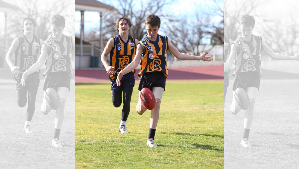 Holiday footy clinic at Tom Flood Centre. James Schischka kicking. Pictures: Peter Weaving 