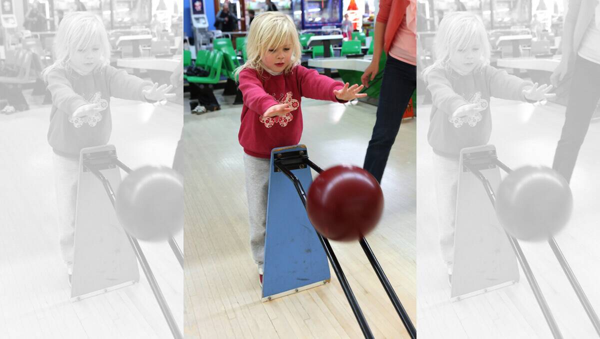 Dragon City Lanes, lanes are full during the school holidays. Navaeh Cullen 4 bowling. Pictures: Peter Weaving 