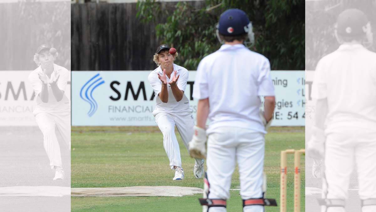 Fielder Cory Tanner catches out the batsman. Picture: Peter Weaving