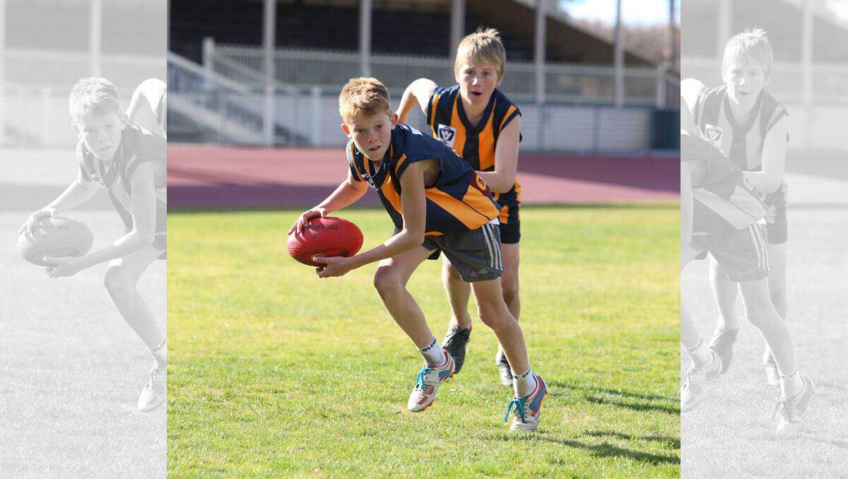 Holiday footy clinic at Tom Flood Centre. Jacob Buckell and Will Wallace. Pictures: Peter Weaving 