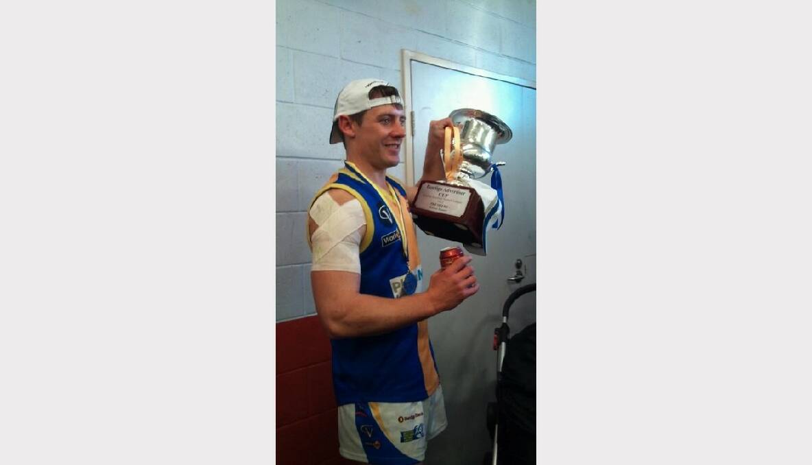 Aiden Pratt proudly displaying the premiership cup. Picture: Bruce Claridge