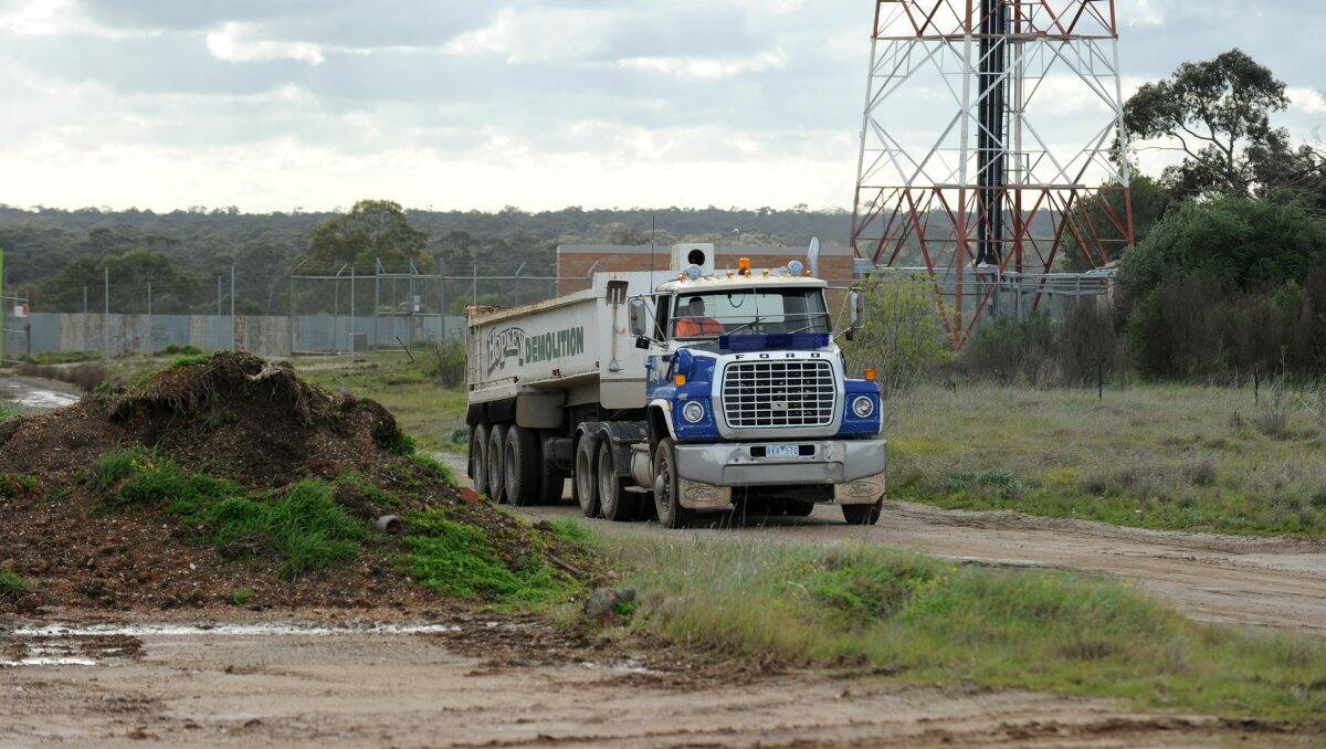 A Hopley Demolition truck transports industrial waste to a crown land site. Picture: Bendigo Advertiser