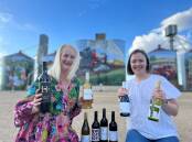 Sadie Vale and Hannah Price preparing for the 2023 Colbinabbin Silo Art Picnic and Wine Festival. Picture supplied
