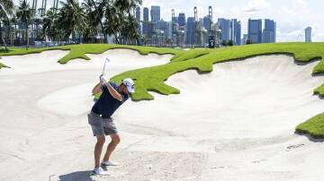 Marc Leishman is two shots off the pace at LIV Singapore, along with fellow Aussie Lucas Herbert. (AP PHOTO)
