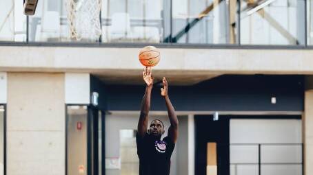 Bul Kuol wants to become the NBL's best defender in his first season with the Sydney Kings. (Syd Nepomuceno/AAP PHOTOS)