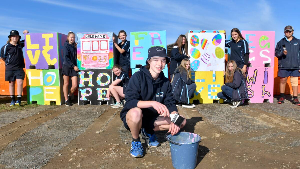 SAFETY: Eaglehawk Secondary College got creative painting their own designs on new safety bollards. Picture: NONI HYETT