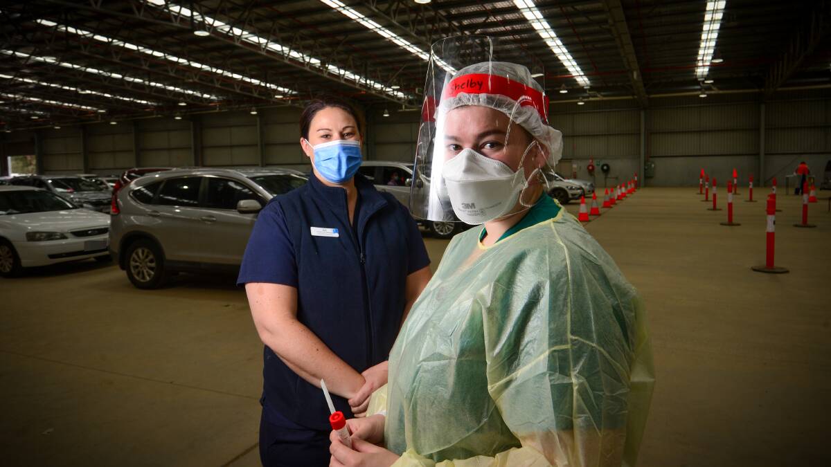 COVID clinic and rapid response team nurse manager Nicole Harper and Registered Undergraduate Student of Nursing Shelby Trigg have been working on Bendigo's frontline. Picture: DARREN HOWE