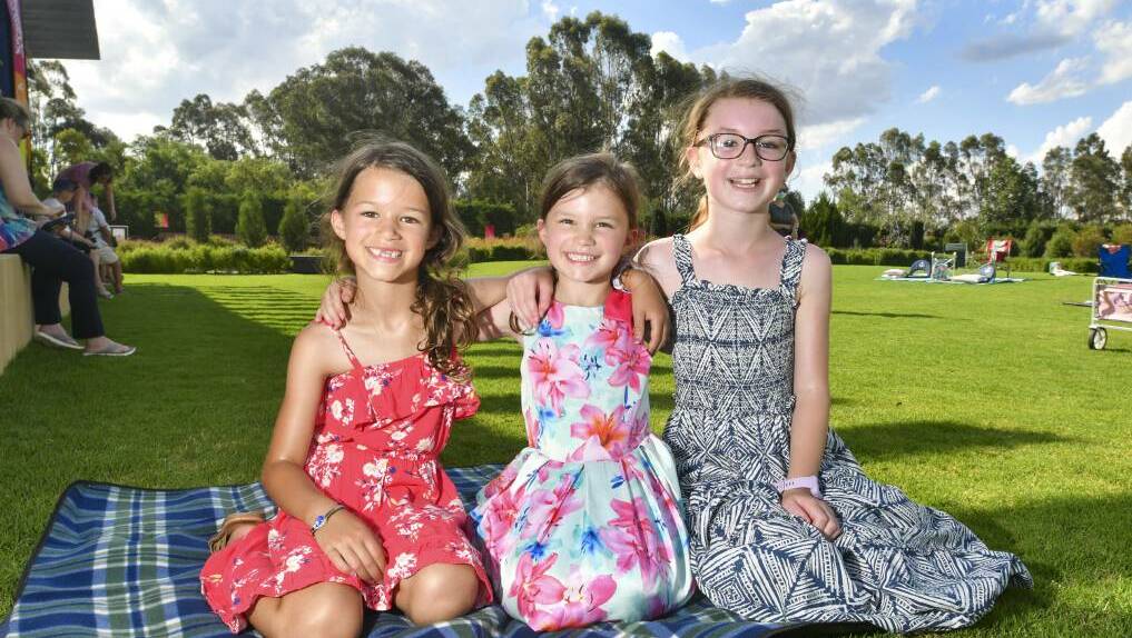 FUN: Isla, Edie and Lucy Patching enjoyed the free outdoor movie screening back in Janurary. Picture: NONI HYETT