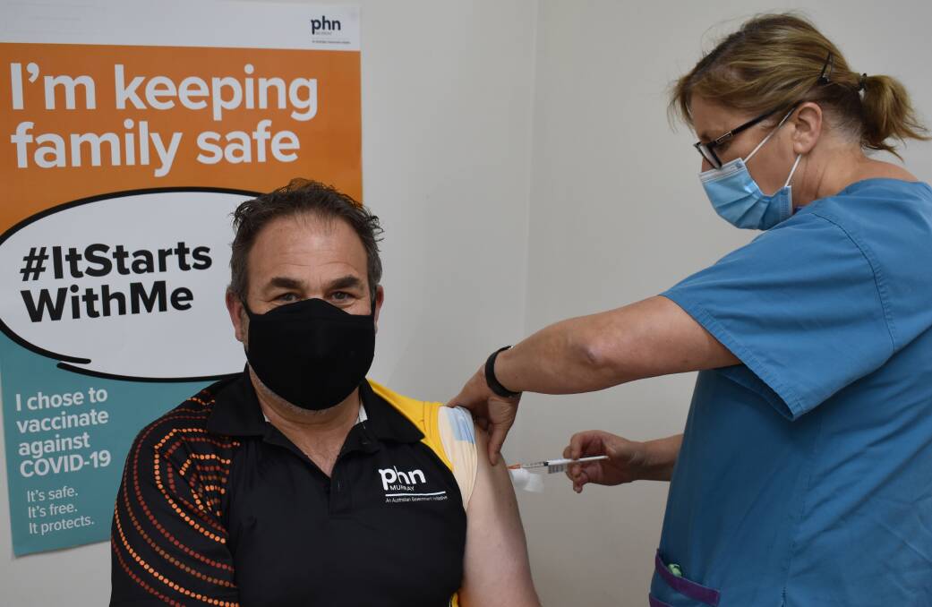 Murray PHN chief executive Matt Jones led by example last week, getting his second COVID-19 vaccination dose at Bendigo Respiratory Clinic, Spring Gully with Clinic director Dr Ewa Piejko. Picture: SUPPLIED