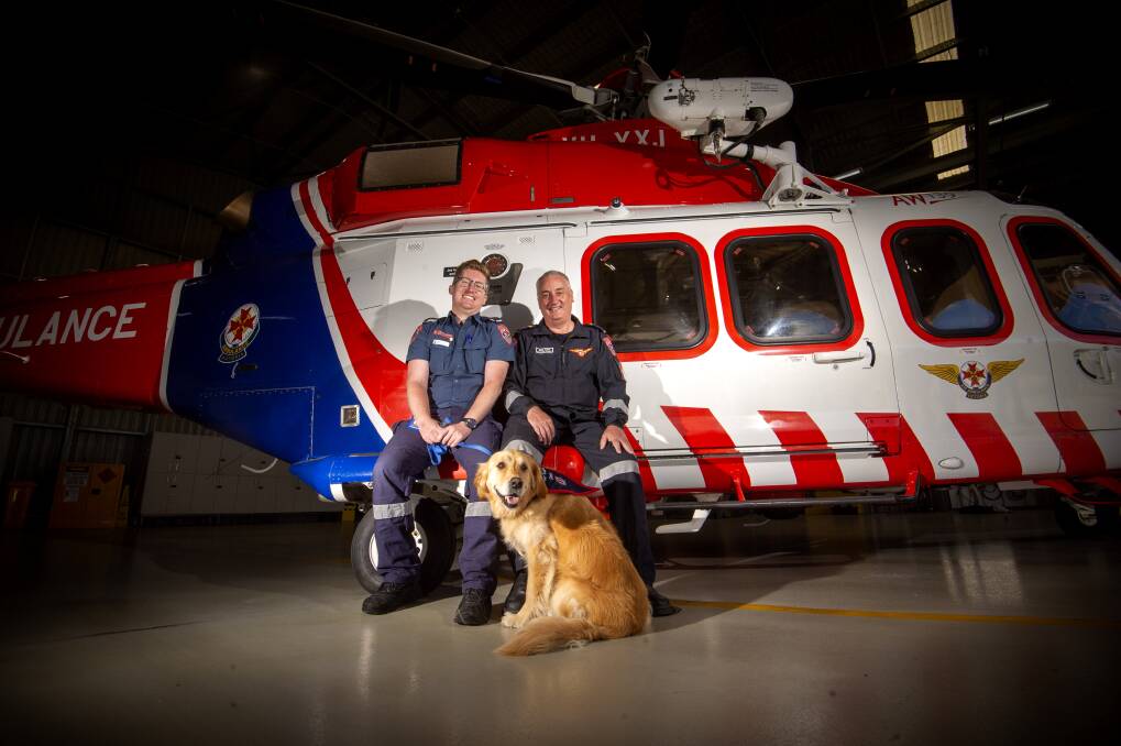 CALLING IT: Justin Nunan is retiring after many years as MICA flight paramedic. Justin is with his son Benjamin Nunan. Picture: DARREN HOWE