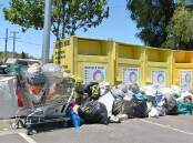 
PROBLEM: Piles of goods left outside recycling bins for a for-profit enterprise in Bendigo a few years ago. Charities experience the same issue and urge people to leave goods at op shops during business hours. Picture: DARREN HOWE