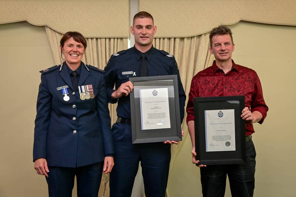 Assistant Commissioner Cindy Millen with Nick Frawley and Senior Constable Rohan De Wys. Picture: Brendan McCarthy 