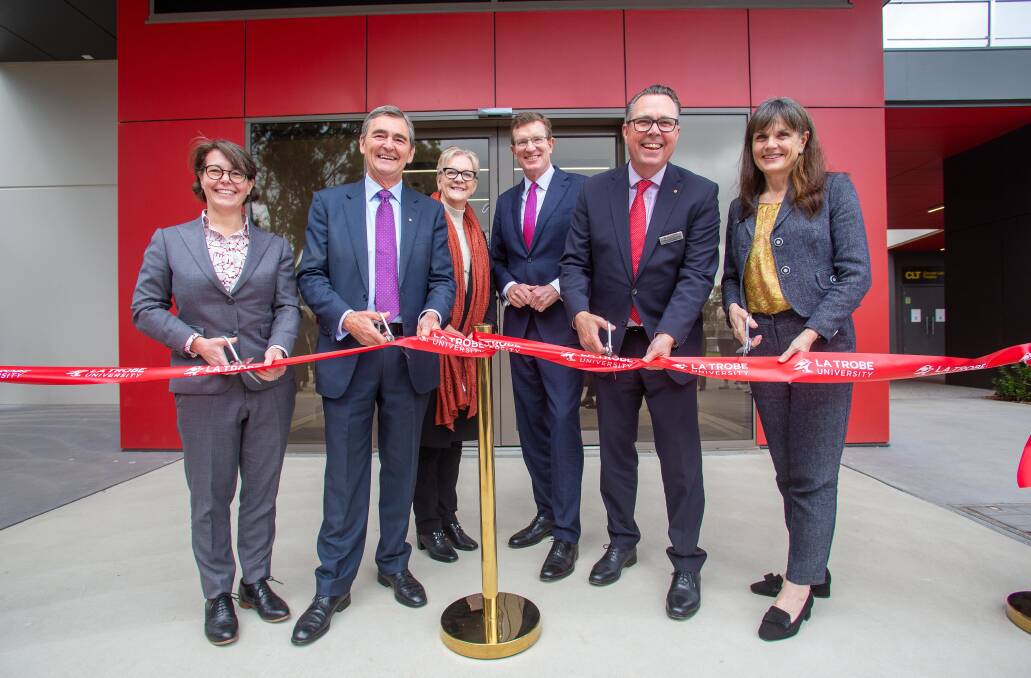 STATE-OF-THE-ART: La Trobe Bendigo campus director Julie Rudner and La Trobe chancellor John Brumby, Bendigo West MP Maree Edwards, Minister for Decentralisation and Regional Education Andrew Gee, La Trobe vice-chancellor John Dewar and university librarian Fiona Salisbury at the official opening of the Bendigo campus's new library on Friday. Picture: PETER WEAVING
