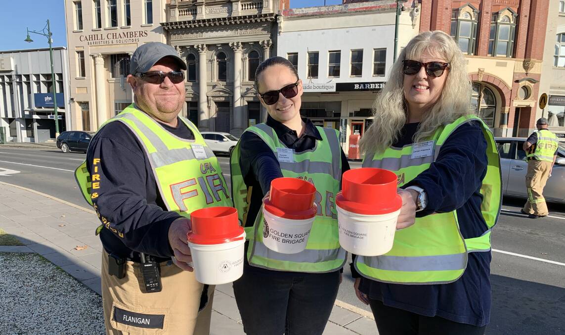 DONATE: Golden Square Fire Brigade lieutenant Greg Flanigan, community safety coordinator Danielle Greenwood, firefighter Carolyn Robinson were out in force on Saturday. Picture: ALLANAH SCIBERRAS