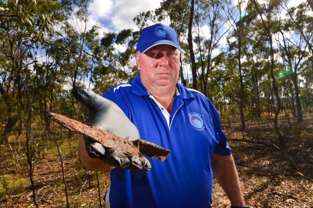HOPE: The search comes after a "significant" find was made, which may hold answers to his disappearance. Daryl Floyd holding a knife. Picture: DARREN HOWE