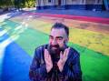  Bendigo Pride Festival director John Richards with the new mural. Picture: DARREN HOWE