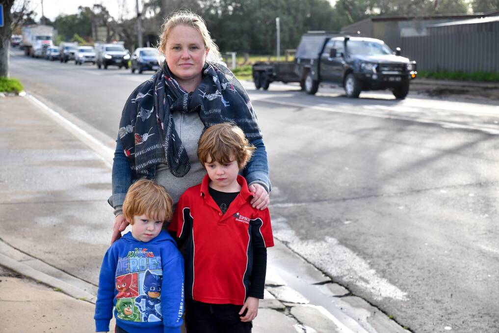 DANGER: Epsom Road Saftey Group member Emma Patten with her children Eli and Nate say the intersection is dangerous. Picture: NONI HYETT 