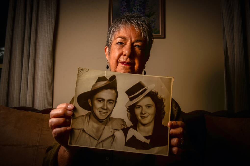 Raye Fleay with picture of her uncle Basil Brown and his wife Ivy Brown. Picture: DARREN HOWE