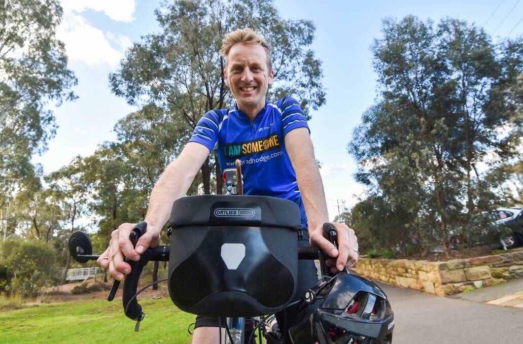 GIVE: Dr Brad Hodge will take his classes on the road next month, as he sets out on an epic bike ride to raise funds for water projects in remote African communities. Picture: DARREN HOWE