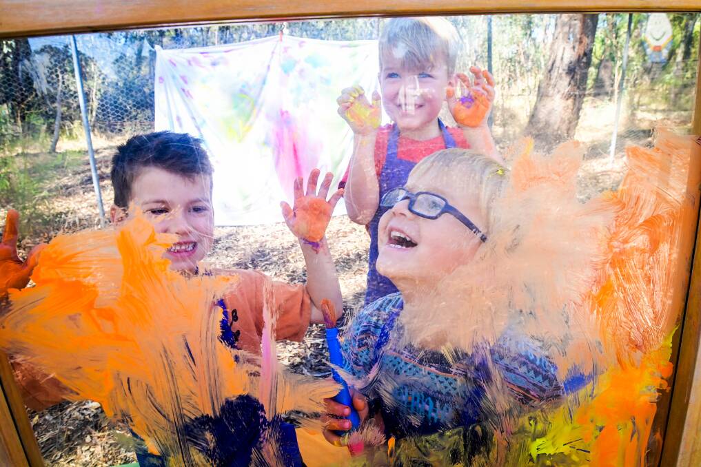 Angus Bourke, William Bourke and Sam West prepare for Messy Play Day at the Bendigo Community Toy Library this weekend. Picture by Brendan McCarthy