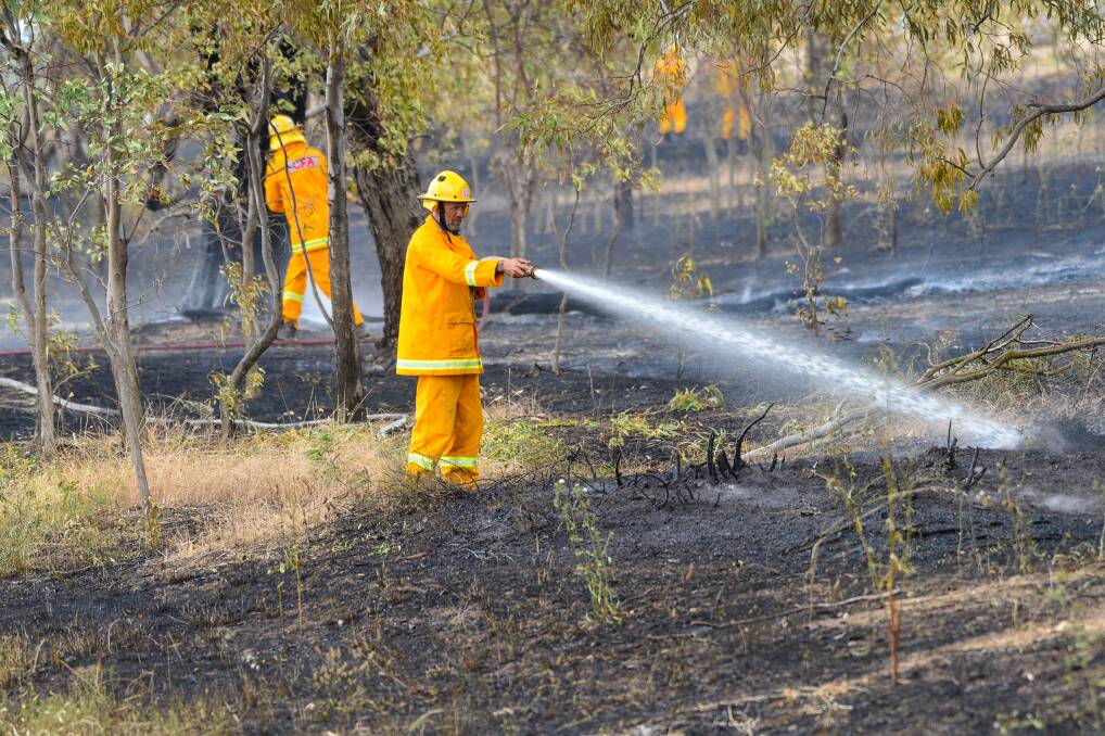 PUT IT OUT: Local CFA crews are urging campers to ensure they keep their sites safe over the next few long weekends. Picture: DARREN HOWE