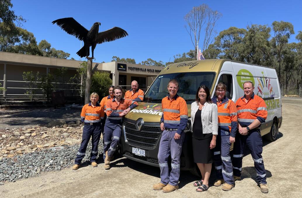 Bendigo Foodshare chief executive Michelle Murphy with Fosterville Gold Mine's Environment and Community team and the charity's van 'Goldy'. Picture supplied