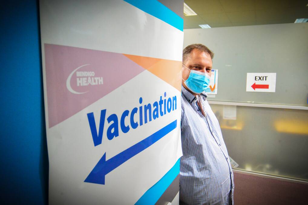 Dan Sheard reminiscing as Bendigo Health marks one year since COVID-19 vaccinations began. Picture: DARREN HOWE