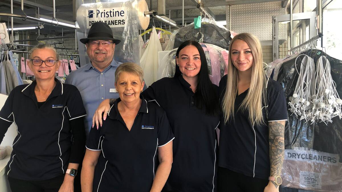 HELP OUT: BCHS chief executive Gerard Jose and the Pristine Dry Cleaners team. Picture: SUPPLIED
